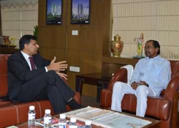 rbi governor promises telangana cm to look into fresh farm loans