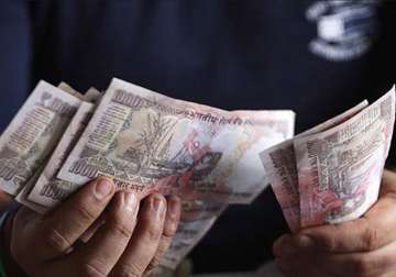 rupee trims initial losses still down 59 paise at 66.42