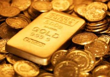 gold tumbles rs 320 silver hit five year low on global cues