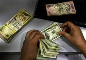 rupee plunges to new 2 yr lows of 65.10 on yuan woes