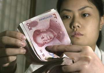 china s move to cut currency reverberates in global economy