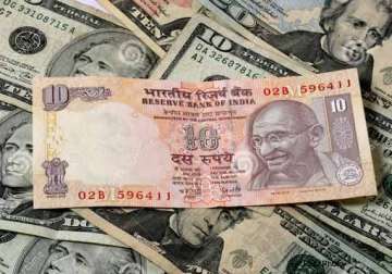 rupee plunges to over 13 month low of 63.67 vs dollar