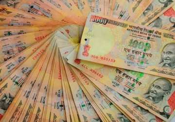 rupee firms up 16 paise against dollar