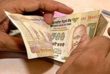 rupee gains 4 paise against dollar in early trade