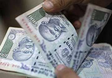 rupee breaches 64 mark hits 20 month low against dollar