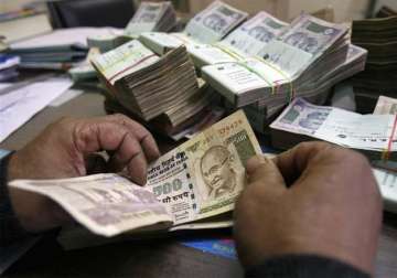 rupee slips from initial gains drops 15 paise against dollar