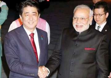 pm modi arrives in tokyo to hold summit talks with abe