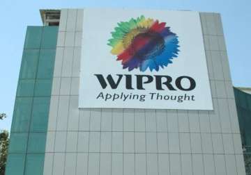 wipro sacks two techies over lawsuit in britain