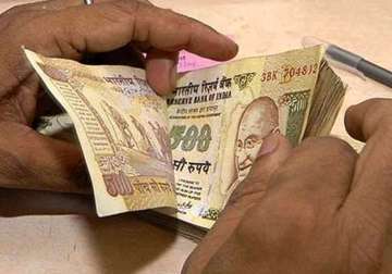 rupee gains 7 paise against dollar in early trade