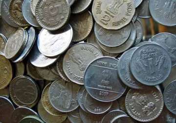 rupee gains 8 paise against dollar