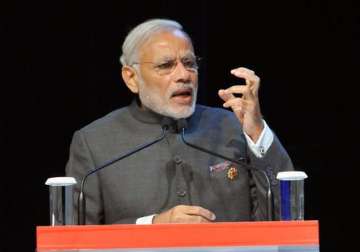 committed to provide transparent predictable tax regime pm modi