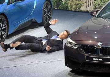 bmw ceo harald krueger collapses during presentation at auto show