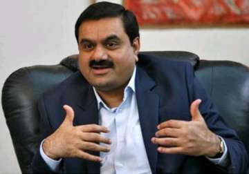 australia green lobby drags adani group to court over mine project