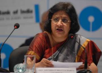 rbi unlikely to cut interest rates in dec policy review sbi chief