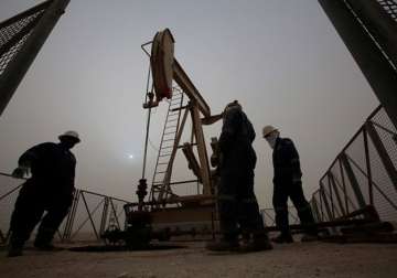 crude oil tumbles below 30 for first time in 12 years