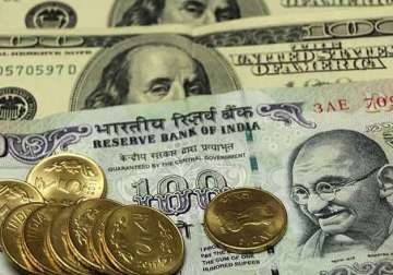 rupee edges up 11 paise against dollar
