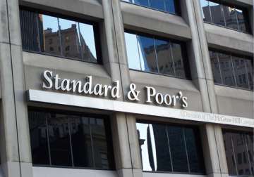 india rejects s p s warning of downgrading its credit rating
