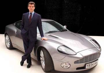 investindustrial beats m m buys 37.5 stake in aston martin for 241 million