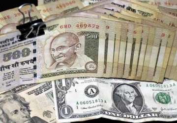 moody s warns rupee fall may constrain sovereign rating