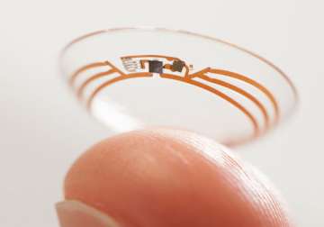 novartis throws weight behind google s smart contact lens