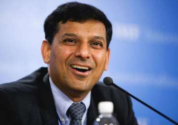 rbi keeps key rates unchanged cuts slr by 0.5