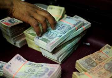 rupee ends flat at 59.90 against dollar