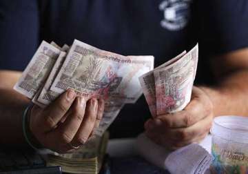 rupee ends 2 paise lower against dollar