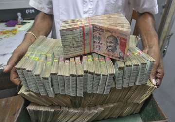 rupee ends unchanged at 61.79 against dollar