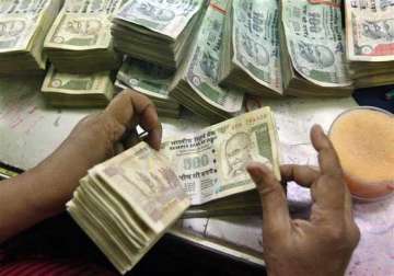 rupee hits over one month high ends 10 paise up