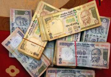 rupee plummets by 77 paise to one month low versus us dollar