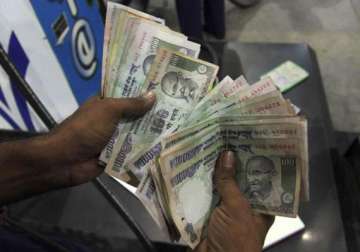 rupee posts first weekly drop in five on rising dollar demand