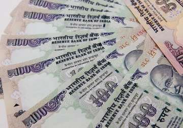 rupee rises from record low zooms 225 paise to 66.55 vs dollar