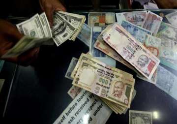 rupee shrugs off initial setback to end almost flat vs dollar
