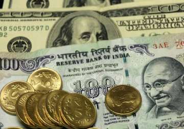 rupee trims initial gains still up by 14 paise vs dollar