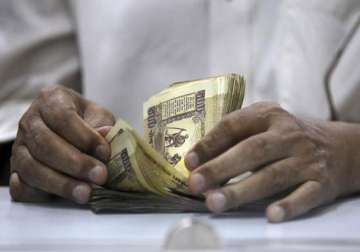 rupee up 20 p at 11 month high vs dollar on sustained inflows
