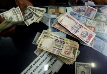 rupee hits all time low of 52.84 against dollar fiis may pull out money