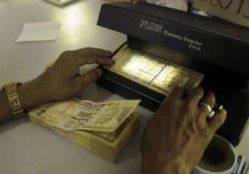 rupee down 17 paise at 49.36/37 against dollar