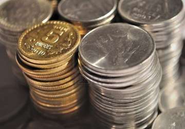 rupee gains 44 paise to close below 50 mark