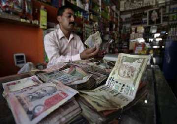 rupee hits two week high at 48.94/95 against dollar