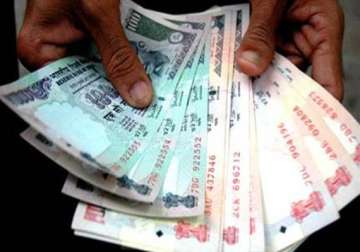 rupee up 26 paise at 51.20/21 against dollar