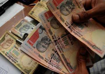 rupee erases initial gains closes 3 paise down against dollar