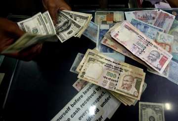 rupee down 26 paise against us dollar in early trade
