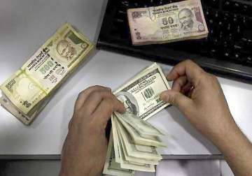 rupee drops further against dollar down 20 paise