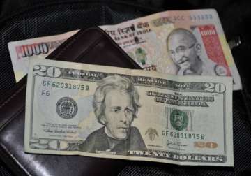 rupee gains 15 paise against dollar