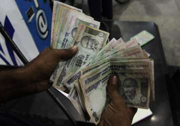 rupee gains 5 paise against dollar to 55.02