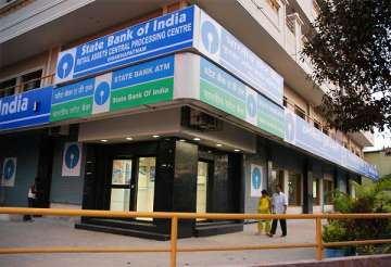 sbi net up 12.4 pc shares tank 7 pc on bad loan concerns