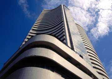 sensex sheds 97 points as ril tcs lose ground