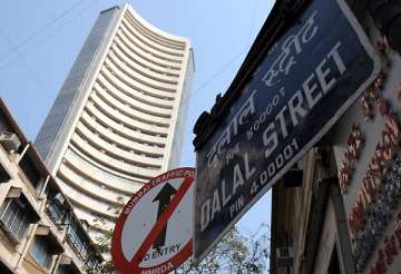 sensex ends lower by 21 pts in lacklustre trade
