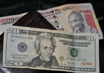 us dollar ends steady against rupee