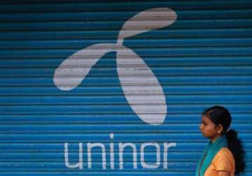 unitech to sell its uninor stake to telenor
